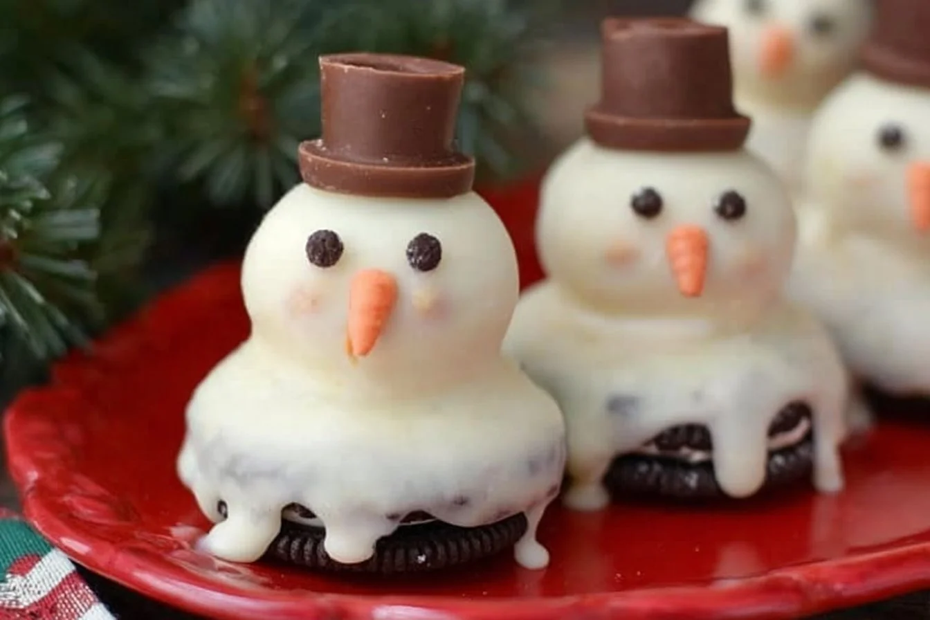 Melting Snowman Oreo Truffles decorated for Christmas