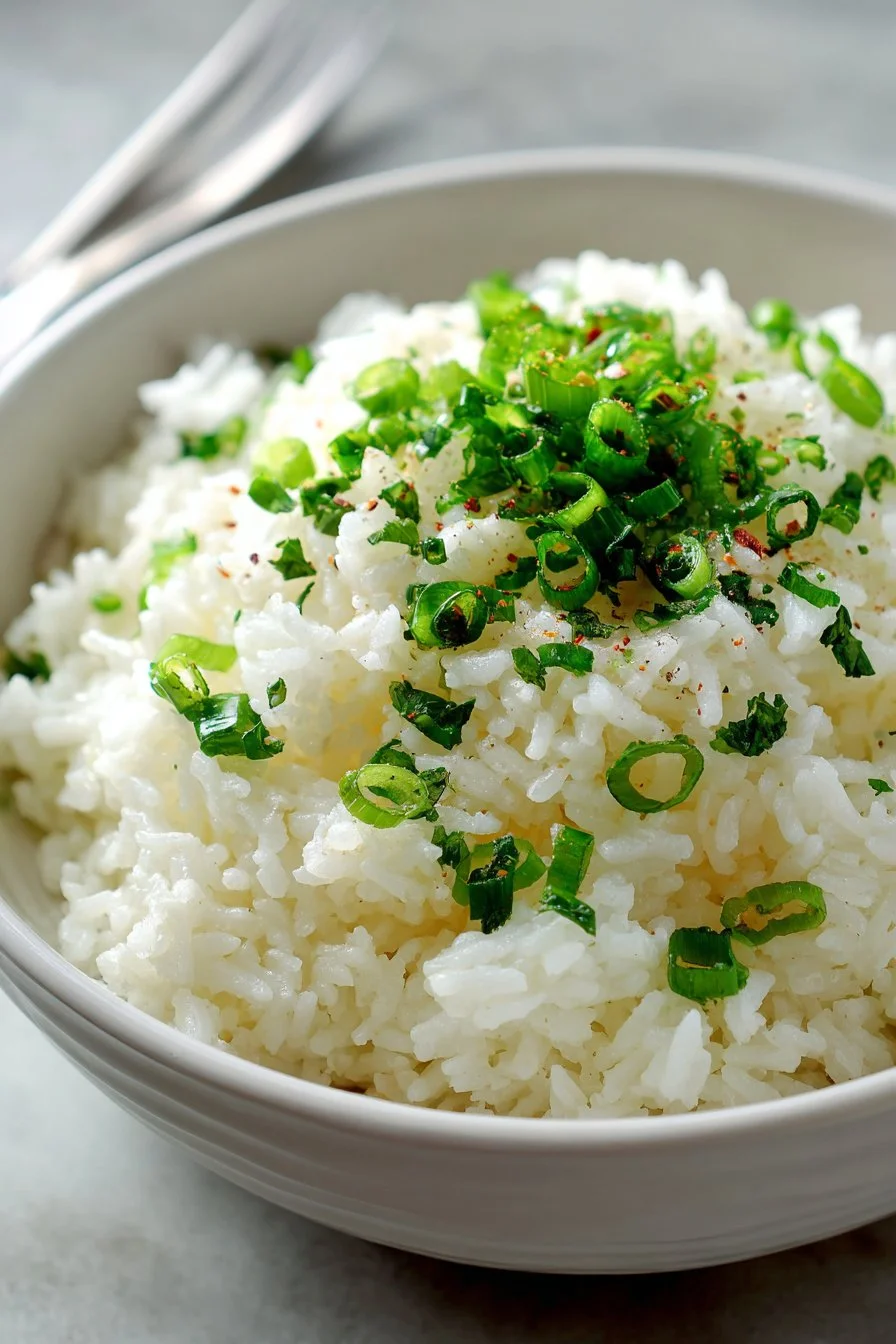 Fluffy jasmine savory coconut rice served in a bowl
