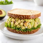 smashed avocado chickpea salad sandwich 2026 06 19 024012 683x1024 1