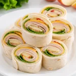 turkey apple cheddar pinwheel wrap 2026 06 19 024011 683x1024 1